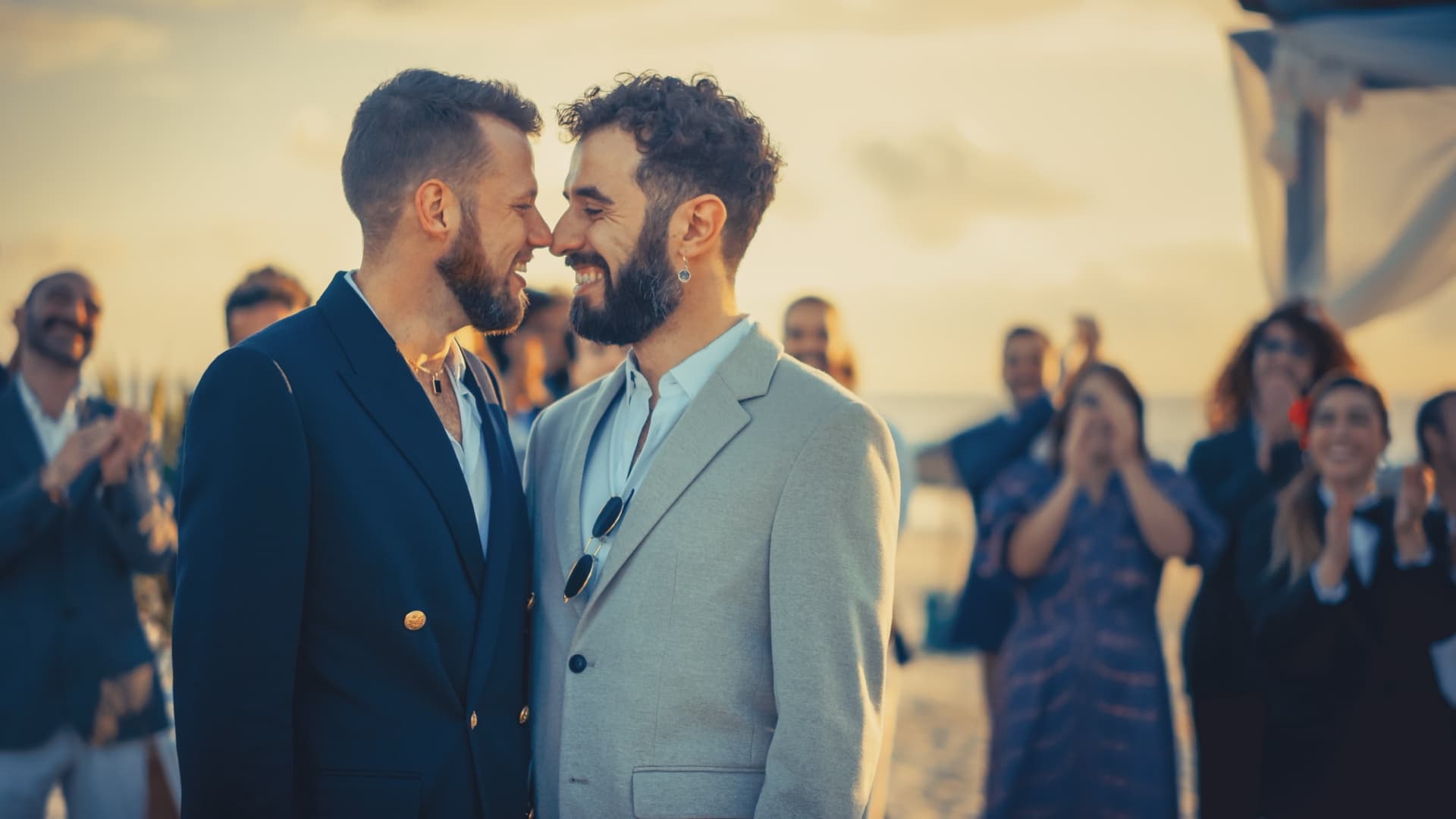 Two men together outdoors, in conversation